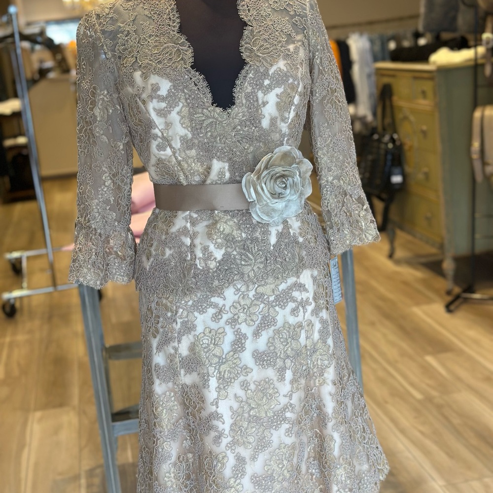 Elegant Lace Dress with Floral Accent